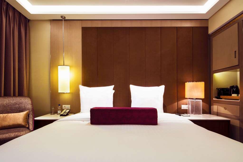 فندق تانجلا بروكسل Kraainem الغرفة الصورة A bedroom at the hotel